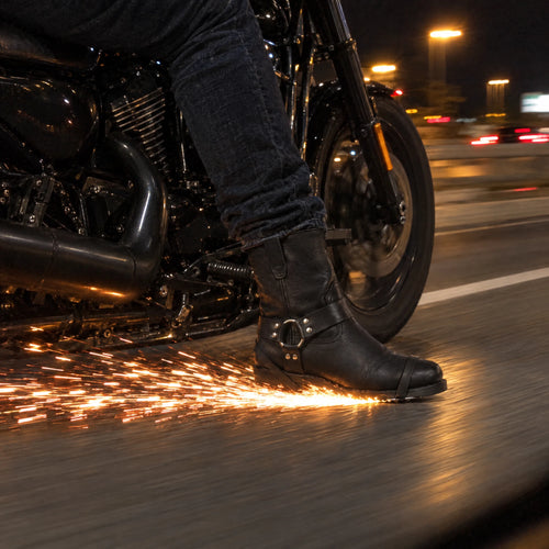 Sparkrider boot throwing sparks on the road at night